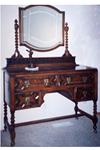 Antique sideboard with beveled mirror